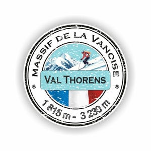 Könnte beinhalten: Ein runder Aufkleber mit einem Skifahrer auf einem schneebedeckten Berg, mit den Texten "Massif de la Vanoise" und "Val Thorens". Der Aufkleber enthält die französische Flagge und eine Höhenangabe von 1.815 m - 3.230 m.