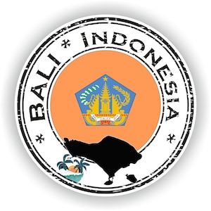 Op de afbeelding: Een ronde zwart-wit stempel met de tekst "Bali Indonesië" en een afbeelding van de Indonesische vlag en het eiland Bali.