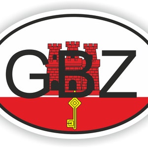 Op de afbeelding: Een witte ovale sticker met een rood-witte vlag. De vlag heeft een rode achtergrond met een witte streep bovenaan. De vlag heeft een rood kasteel met een zwarte omtrek en een gouden sleutel in het midden. De letters GBZ zijn in zwart op de vlag gedrukt.