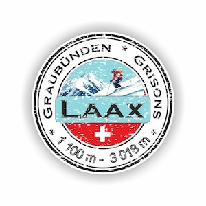 May include: A round sticker featuring a skier on a snowy mountain slope. The sticker has the text "LAAX" in a blue rectangle, with the text "GRAUBÜNDEN GRISONS" around the edge. A Swiss flag is at the bottom, with altitude details.