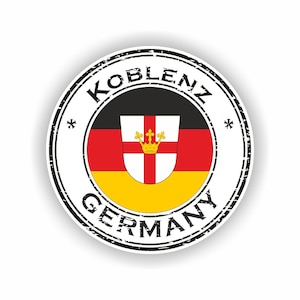Op de afbeelding: Een ronde sticker met het wapen van Koblenz. Het ontwerp bevat de naam van de stad en "Duitsland" in een cirkelvormige rand. Het wapen heeft een wit schild met een rood kruis, een gouden kroon en de kleuren van de Duitse vlag.