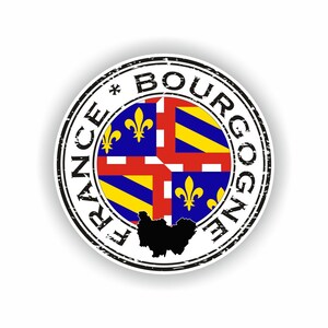 Może przedstawiać: Okrągła, czarno-biała, zużyta pieczątka z tekstem "FRANCE*BOURGOGNE" wokół krawędzi. W środku pieczątki znajduje się flaga Burgundii, Francji, oraz czarna sylwetka regionu.