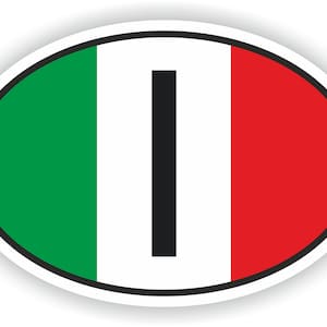 May include: Oval sticker with the Italian flag colors: green, white, and red. A black vertical line is in the center of the white stripe. The sticker has a white border.