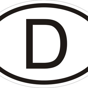 May include: Oval sticker, white with a black border, featuring a bold black "D" for Germany. Commonly used on vehicles to indicate the country of origin, this sticker is a familiar sight.