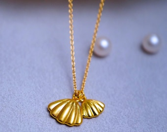 Gouden schelpketting sierlijke hanger schelp sieraden strandstijl kustaccessoire zomercadeau liefde symbool bescherming innerlijke kracht energie