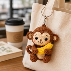 Llavero de mono de ganchillo, adorable colgante de mono plátano amigurumi para bolso, llavero de animal hecho a mano, regalo kawaii para amantes de los monos.