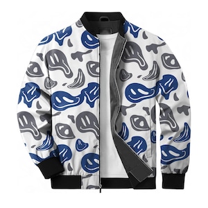 May include: White bomber jacket with a repeating pattern of blue and gray smiley face designs. The jacket has a black collar, cuffs, and hem, and a full-length zipper. A white t-shirt is visible underneath.