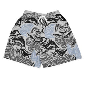 May include: Light gray shorts with an all-over eye pattern in black and gray, with light blue wavy accents. The shorts have a drawstring waistband.