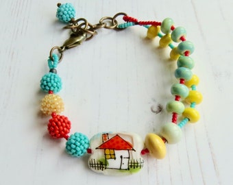 Handmade house bead bracelet - Home Sweet Home - handmade artisan bead bracelet in primary colours - Songbead, UK,