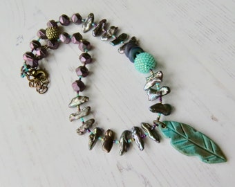 Handmade artisan bead necklace - Follow your Arrow- handmade artisan beaded purple, silver and turquoise necklace with pearls and feather