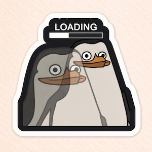 May include: A white ceramic mug with a black handle and the text "But First, Coffee" in a bold, black font. The mug is set against a blurred background, suggesting a cozy setting.