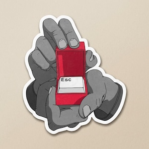 May include: A sticker featuring a red ring box with the word "Esc" on a white keyboard key. The box is held open by two gray hands, creating a unique and humorous design.