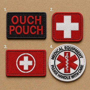 May include: Four embroidered patches: a black rectangular patch with red text reading OUCH POUCH, a red square patch with a white cross, a red rectangular patch with a white cross in a circle, and a circular white patch with a red star of life symbol.