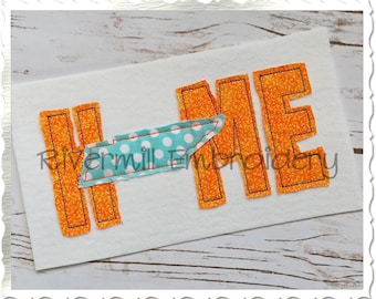 May include: Orange and blue embroidered design of the word "HOME" with the state of Tennessee in the middle of the "H".
