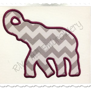May include: A gray and white chevron patterned elephant applique with a burgundy outline. The applique is perfect for embroidery projects.