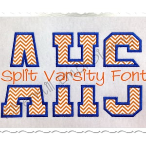 May include: Split Varsity Font embroidery design featuring the letters A, U, C, A, I, and J. The letters are outlined in blue and filled with an orange and white chevron pattern.