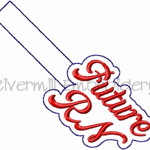 May include: Red embroidered design with the text "Future Dr." in a white cloud shape with a blue outline. The design is on a white background.