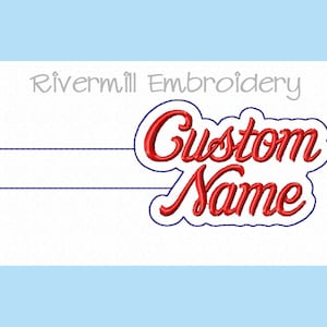 May include: Red embroidered text that says "Custom Name" with a blue outline. The text is on a white background with the words "Rivermill Embroidery" at the top.