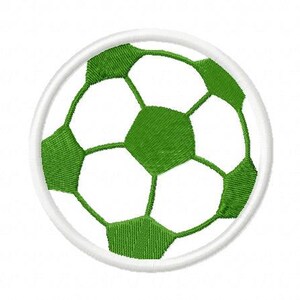 May include: A white and green embroidered patch of a soccer ball.