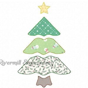May include: A patchwork Christmas tree applique design with a green, white and red colour scheme. The tree has a star on top and a brown trunk.