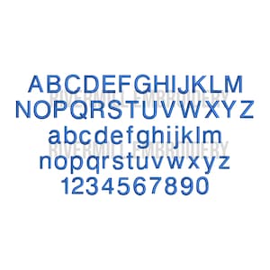 May include: Blue embroidered alphabet letters, numbers, and symbols are displayed on a white background. The letters are in uppercase and lowercase, with numbers 0-9. The text "RIVERMILL EMBROIDERY" is watermarked.