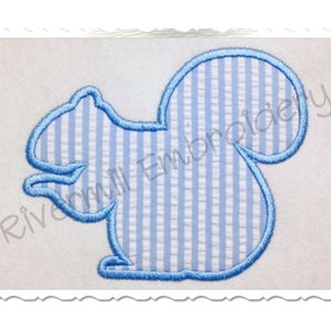 May include: Blue applique design of a squirrel, perfect for embroidery projects.