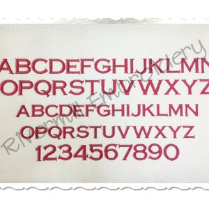 May include: A white background with a red embroidered alphabet and numbers. The letters are uppercase and the numbers are in a standard font.
