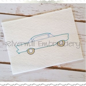 May include: A teal blue outline of a vintage car with yellow wheels. The car is facing right and has a single window.