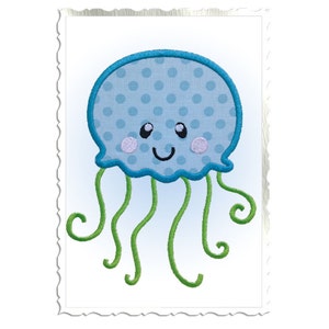 May include: A blue and green embroidered jellyfish with a smiling face and white polka dots. The jellyfish has a round body and long, curly tentacles.