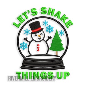 May include: Green and white embroidery design with the text "Let's Shake Things Up" and a snowman inside a snow globe with a Christmas tree.