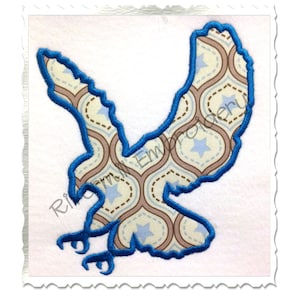 May include: Blue outline of an eagle with a brown and blue patterned design. The eagle is facing right and has its wings spread.