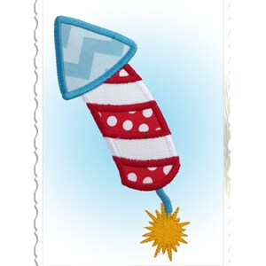 May include: A red and white striped firework with white polka dots and a blue pointed top. The firework has a yellow star-shaped fuse.