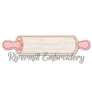 May include: A brown wooden rolling pin with pink polka dot handles. The rolling pin is a blank canvas for embroidery.