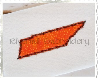May include: Orange and black embroidered outline of the state of Tennessee. The embroidery is on a white fabric background.