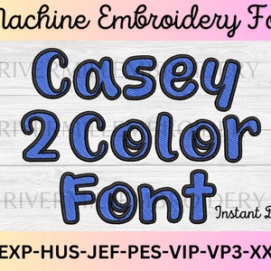 May include: Blue and black embroidery font design for machine embroidery. The font says "Casey 2 Color Font" and includes the text "Instant Download" and "DST-EXP-HUS-JEF-PES-VIP-VP3-XXX-BX".