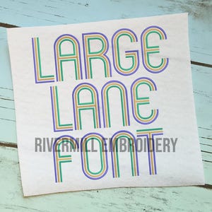 May include: A white background with the text "LARGE LANE FONT" in a multi-colored, layered, retro font style. The text is in a green, gold, and purple color scheme.