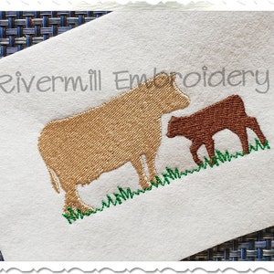 May include: Embroidered design of a brown cow and a calf standing in a field of green grass. The design is perfect for a farm-themed project.