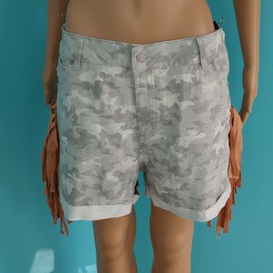 Pantalones cortos deshilachados hot sale