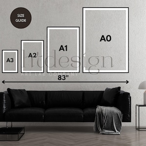 May include: A wall display featuring framed art prints in A0, A1, A2, and A3 sizes, with a total width of 83 inches. The prints are displayed above a black leather sofa. The wall is a light gray color.
