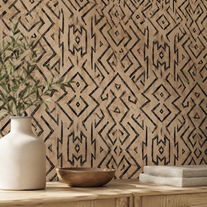 May include: A wallpaper featuring a repeating geometric pattern of black lines on a light tan background. The design consists of interconnected diamonds, zigzags, and angular shapes that create a structured, symmetrical visual texture across the surface.