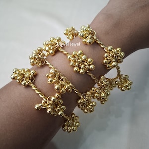 Ghungroo gouden armband traditionele 4-delige etnische geoxideerde armband trendy slijtage Bollywood-sieraden