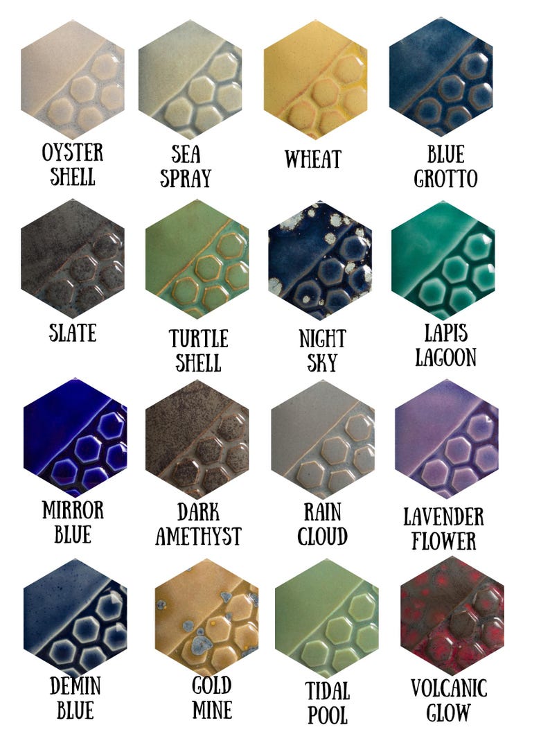 May include: A grid of sixteen hexagonal ceramic glaze samples, each featuring a smooth section and a textured honeycomb pattern. Colors include Oyster Shell, Sea Spray, Wheat, Blue Grotto, Slate, Turtle Shell, Night Sky, Lapis Lagoon, Mirror Blue, Dark Amethyst, Rain Cloud, Lavender Flower, Demin Blue, Gold Mine, Tidal Pool, and Volcanic Glow.