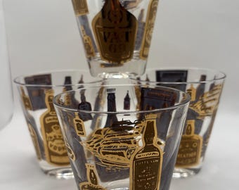 Zestaw 4 złotych szklanek do napojów MCM w kształcie butelek: Cutty Sark, VAT 69, Smirnoff