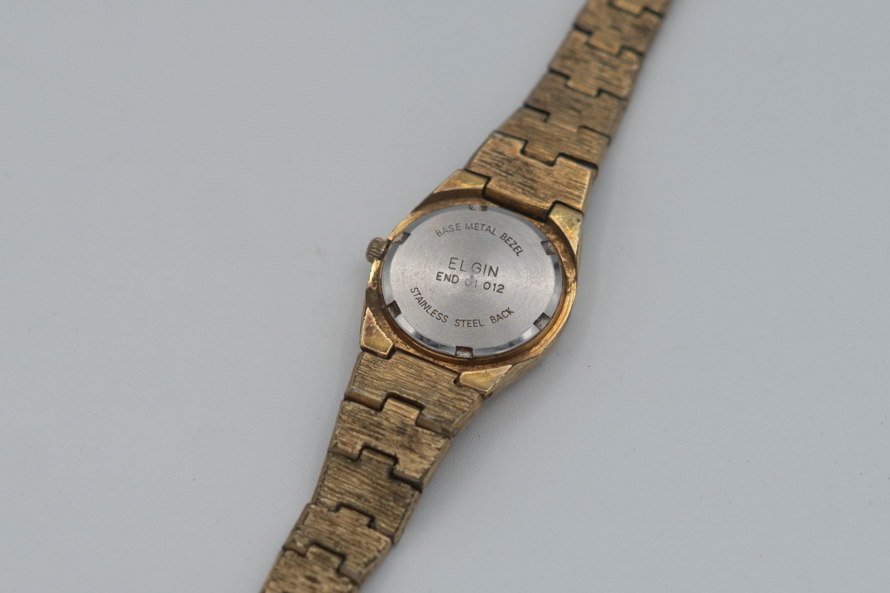 Vintage Elgin Ladies Goldtone Nugget Diamond Accent Quartz Watch GUC 6.5” long Vintage Elgin Black & Gold Nugget Simulated Diamond Crystal  main image 2