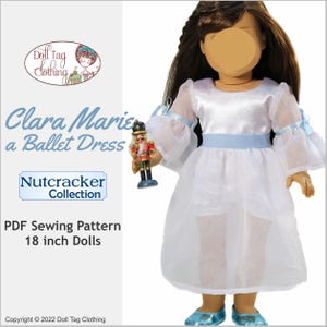 May include: A PDF sewing pattern for an 18 inch doll ballet dress. The pattern is called "Clara Marie a Ballet Dress" and is part of the "Nutcracker Collection". The image shows a doll wearing the dress, holding a nutcracker.