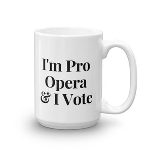 May include: White ceramic coffee mug with black text that reads "I'm Pro Opera & I Vote".