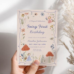 Fairy first birthday invitation with enchanted forest fairy garden theme and pastel boho wildflower party design for baby girl 1st birthday