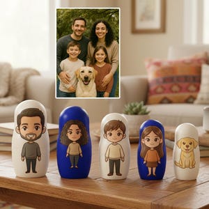 May include: A set of five nesting dolls, each with a cartoon illustration of a family member and a dog. The dolls are white and blue, with a family portrait in the background.