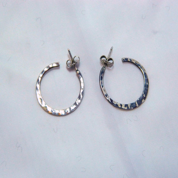 Small hoop earrings with a hammered finish