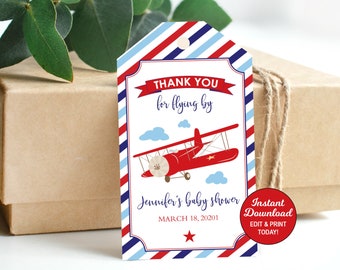 May include: Red, white, and blue striped thank you tag with a red airplane and the text "Thank you for flying by Jennifer's baby shower March 18, 2020". The tag also has a red circle with the text "Instant Download Edit & Print Today!"